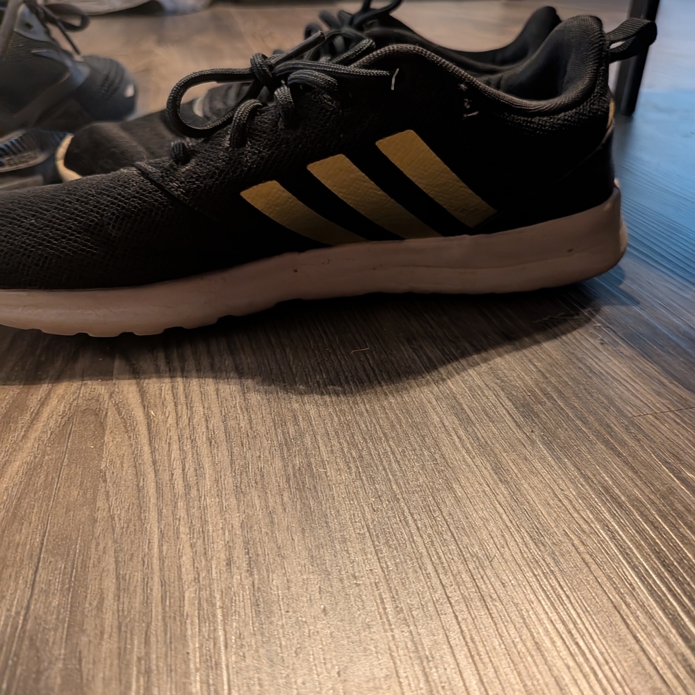 Adidas Sneakers in Black and Gold